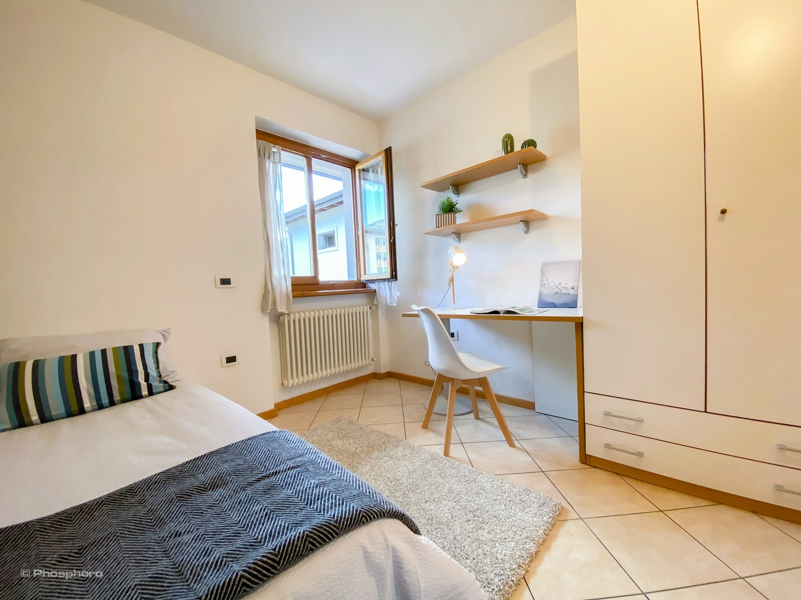 The perfect bedroom: comfort and functionality in the PHO.ROOM residence